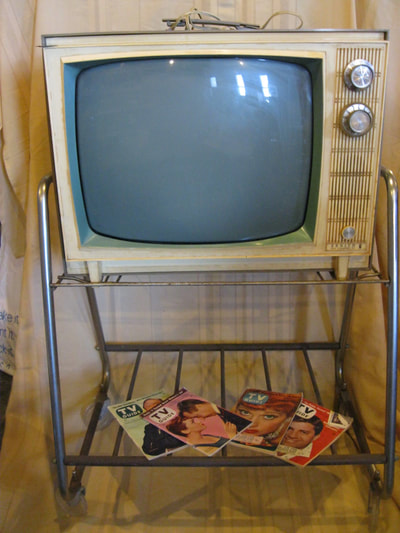 Early 1960s TV with cart, fully functional