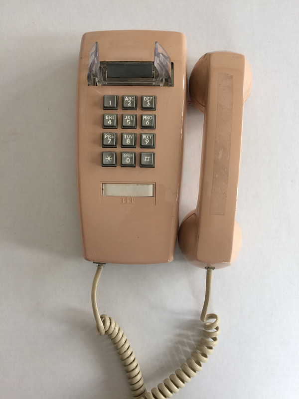 1990s wall telephone pink beige